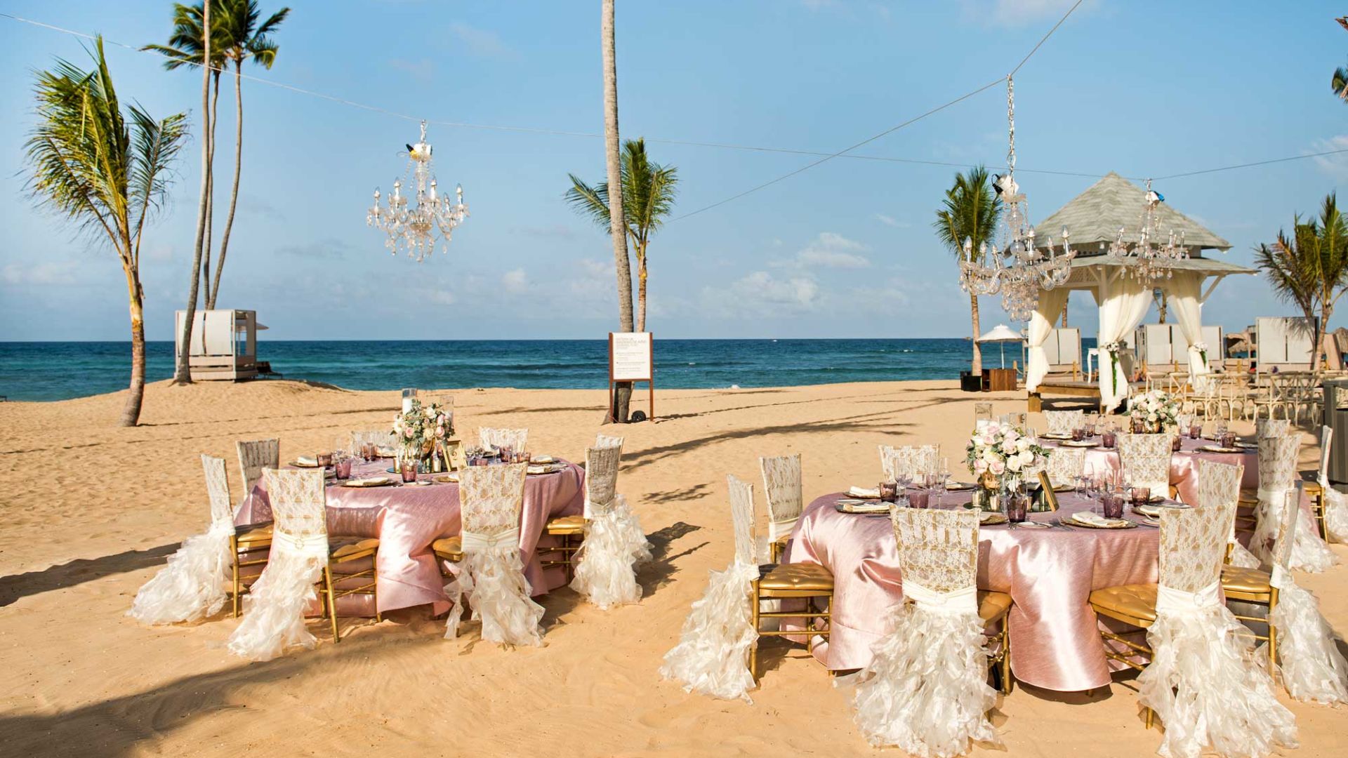 A Set Of Tables On A Beach