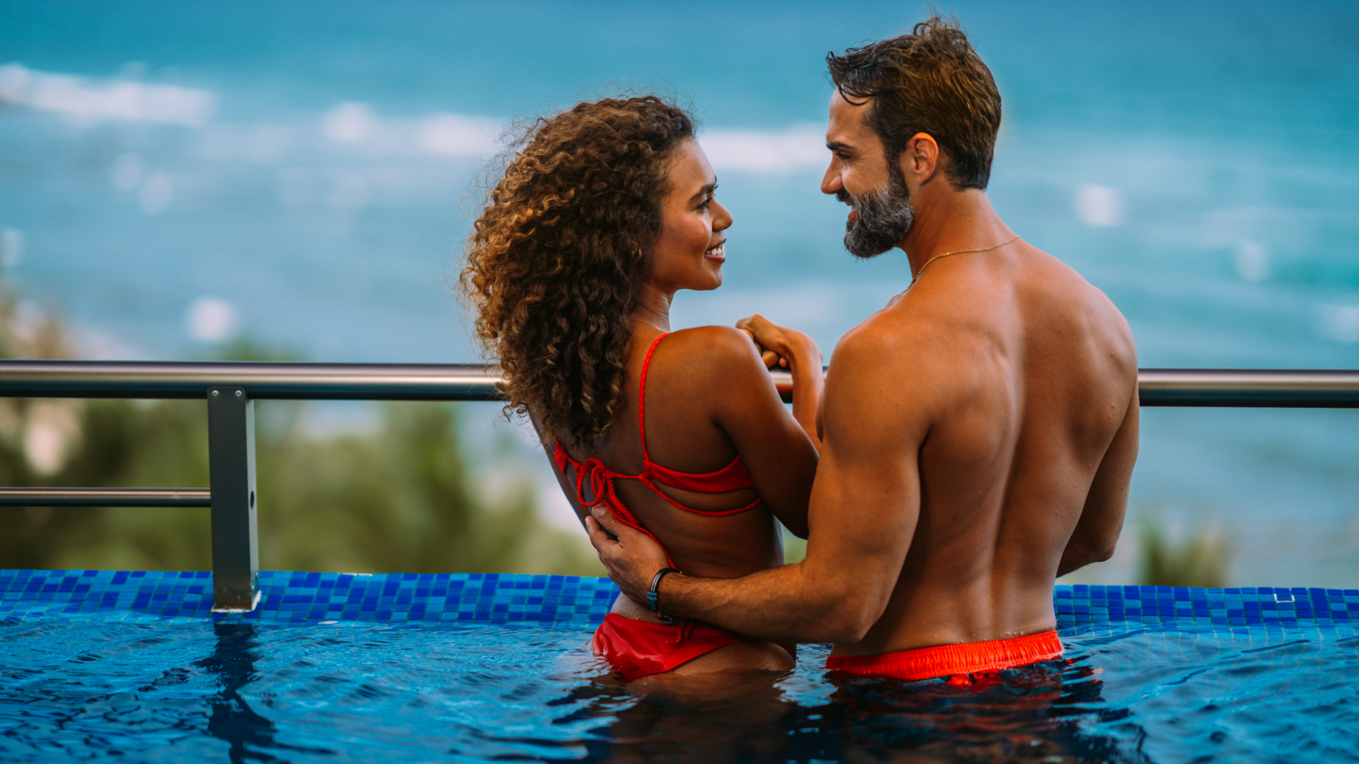 A Man And Woman In A Pool
